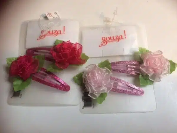 Haarclips bloem donker roze