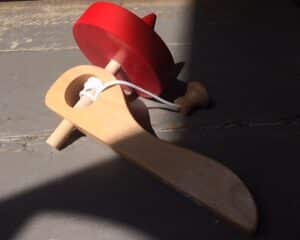 Houten tol met handvat